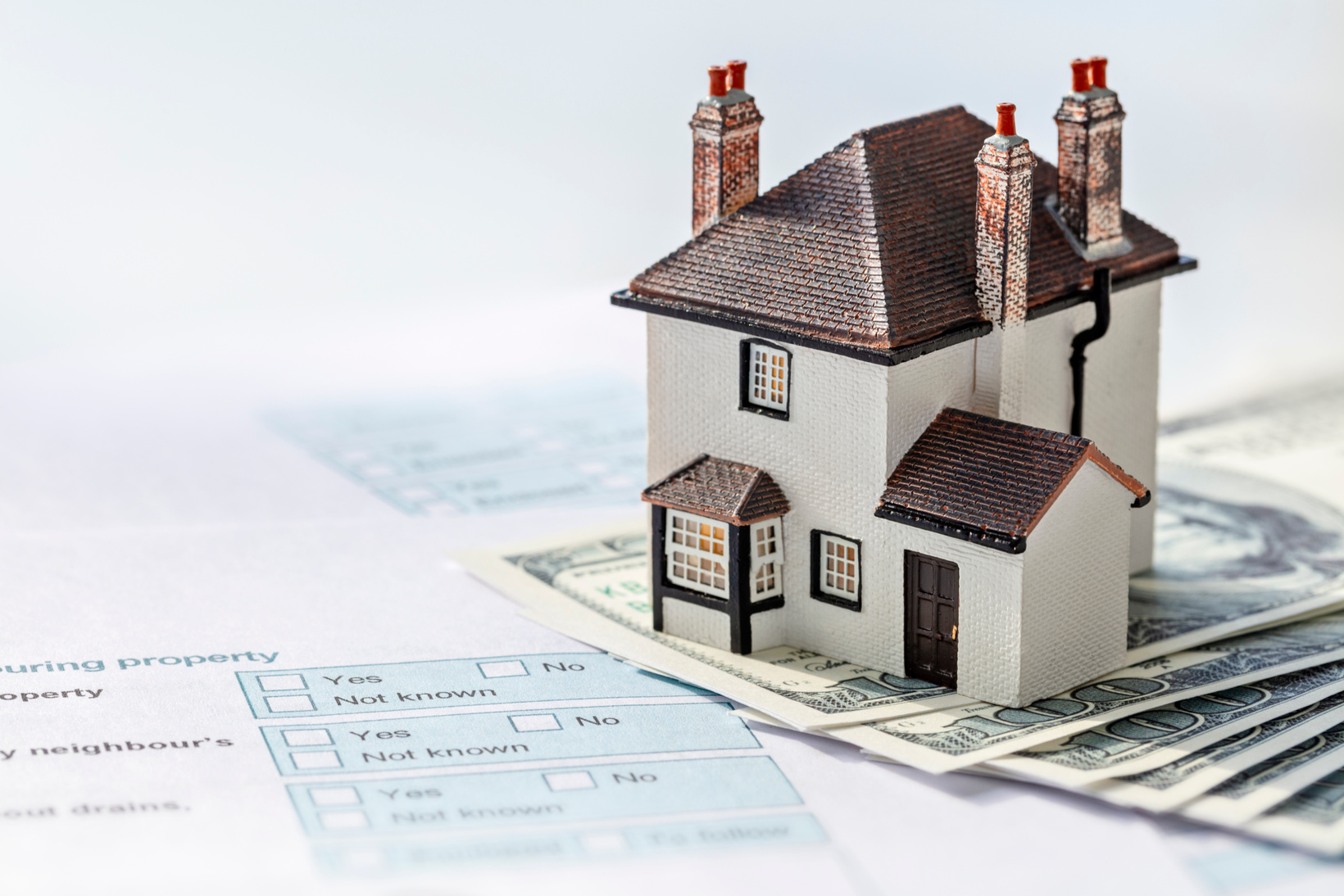 House on money, mortgage or property real estate tax